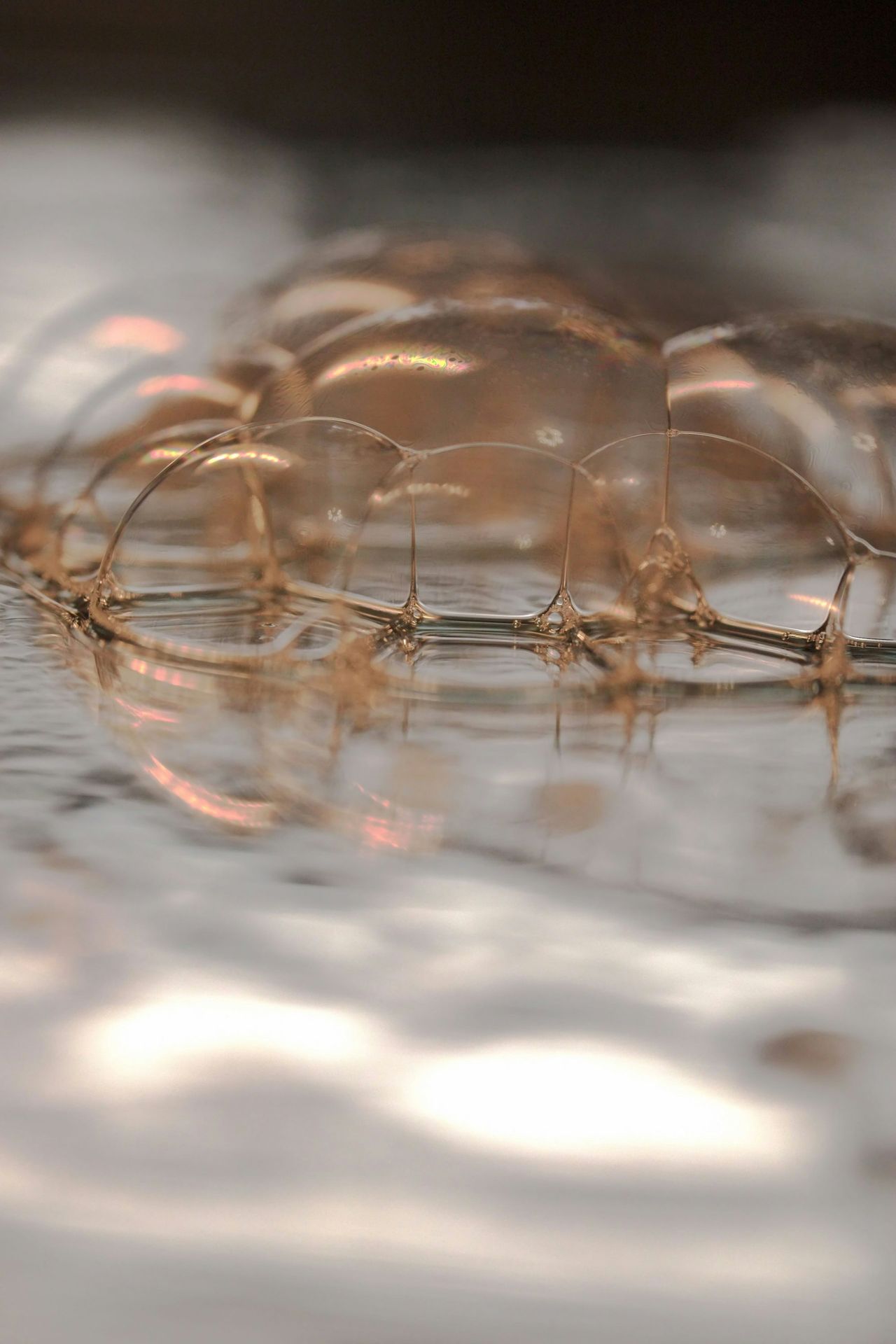 a close up of a water droplet on a surface